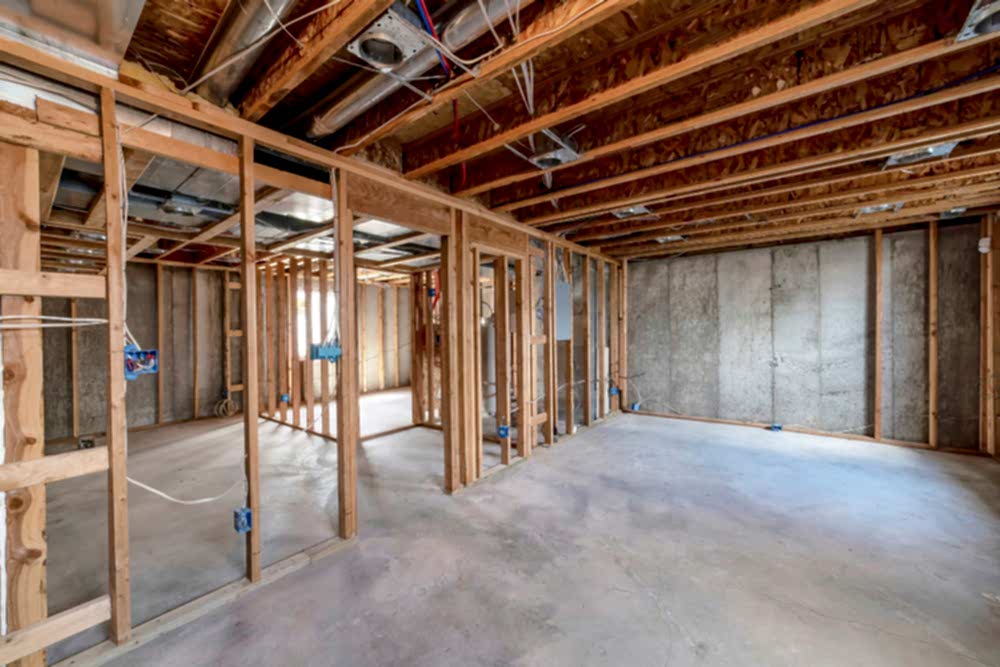 unfinished concrete basement ready for epoxy flooring