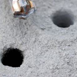 holes drilled for concrete raising in Illinois